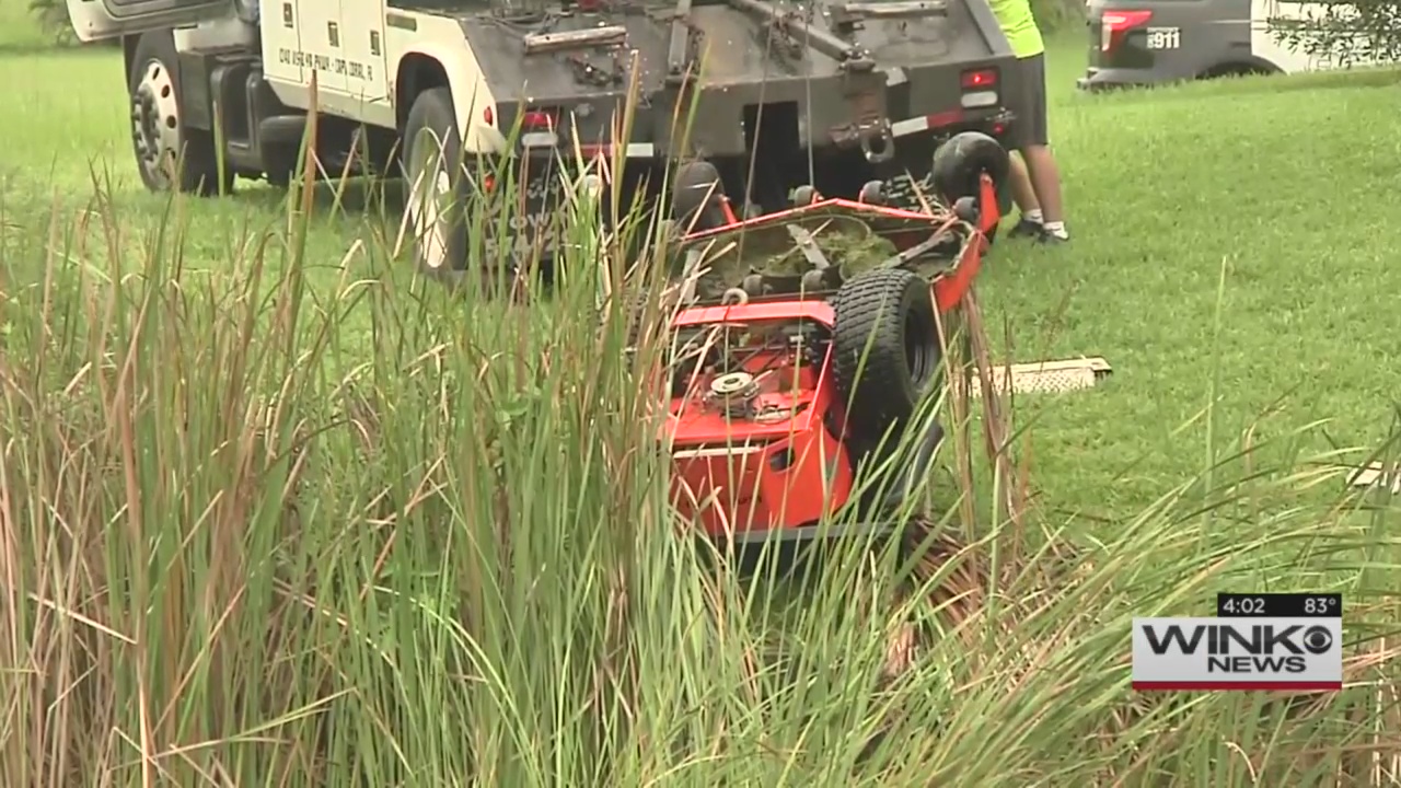 Man falls into canal, gets pinned under lawn mower