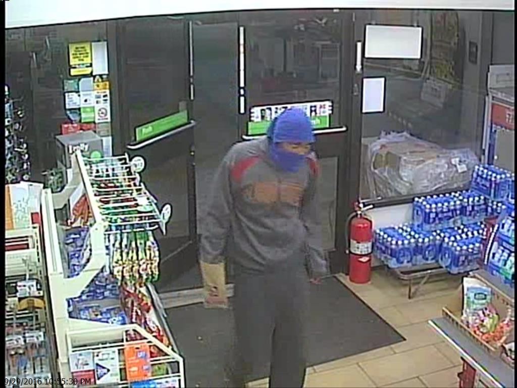 Surveillance photo released in 7-Eleven armed robbery