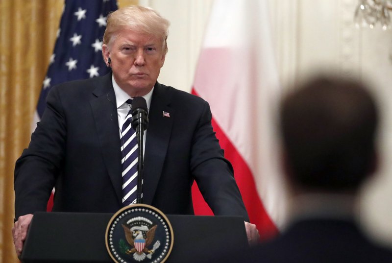 FILE: President Donald Trump listens to a reporter's question during a news conference with Polish President Andrzej Duda, in the East Room of the White House, Tuesday, Sept. 18, 2018, in Washington. (AP Photo/Alex Brandon/FILE)