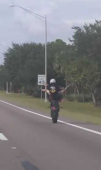 Stunt biker driving in North Fort Myers. Photo via YouTube.