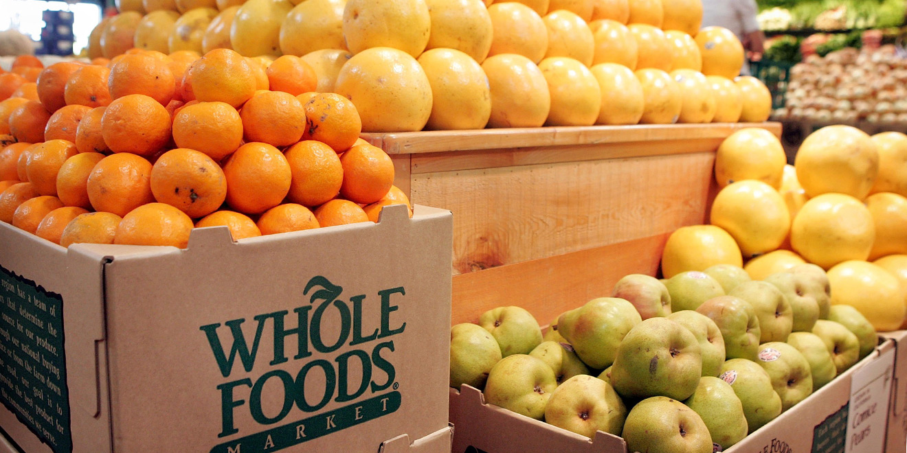 Various fruits for sale at a Whole Foods store. Photo via CBS News.