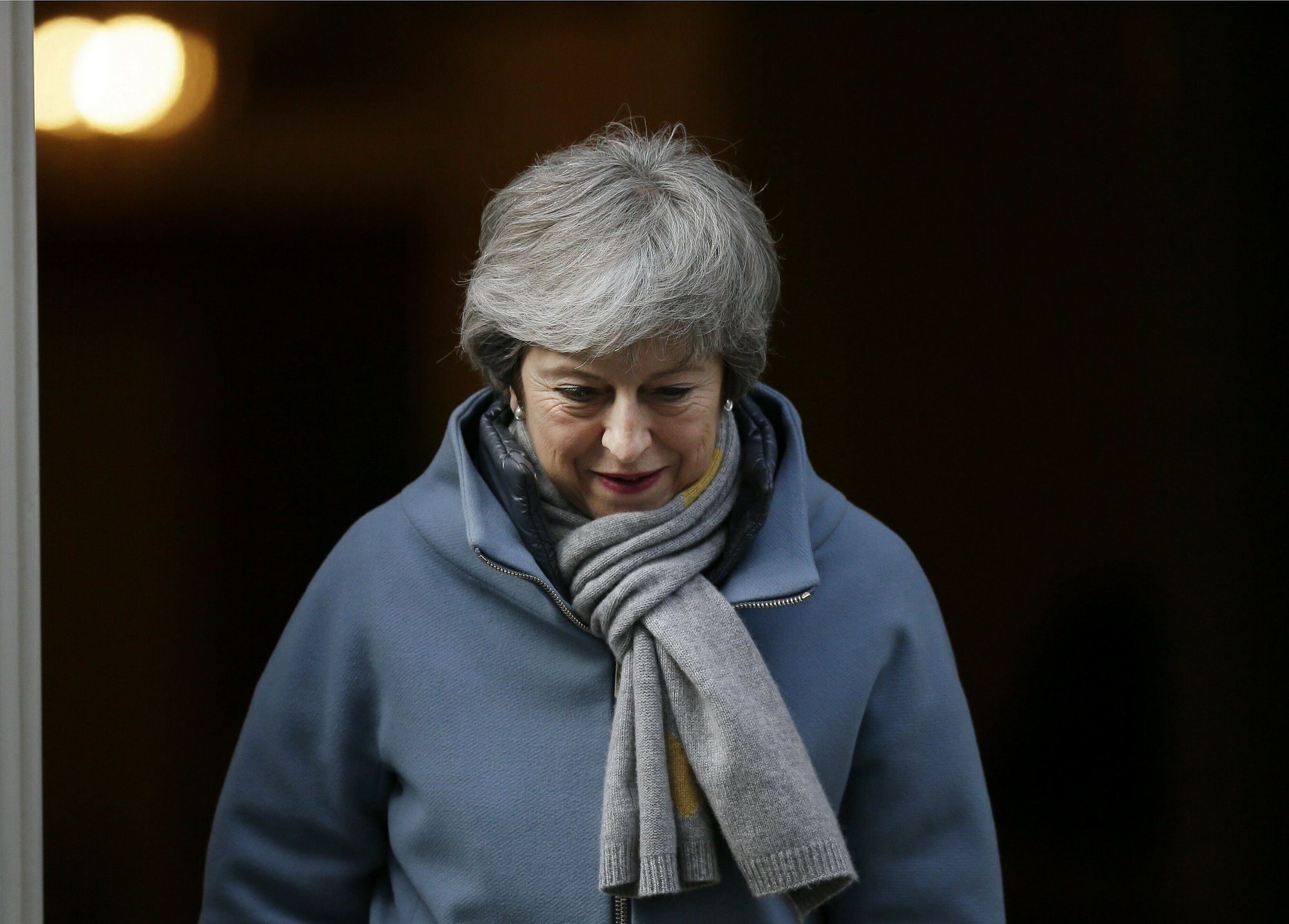 Britain's Prime Minister Theresa May leaves 10 Downing street in London, Thursday, March 14, 2019. British lawmakers faced another tumultuous day Thursday, as Parliament prepared to vote on whether to request a delay to the country's scheduled departure from the European Union and Prime Minister Theresa May struggled to shore up her shattered authority. (AP Photo/Tim Ireland)