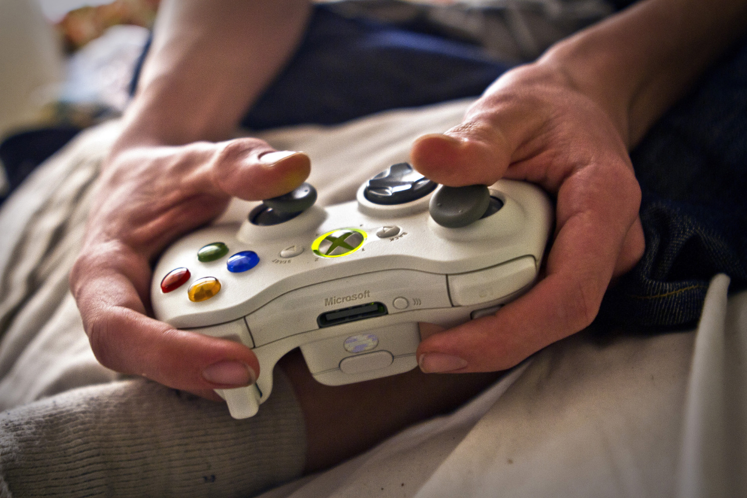 Person plays video games on an Xbox. (Credit: CBS News)