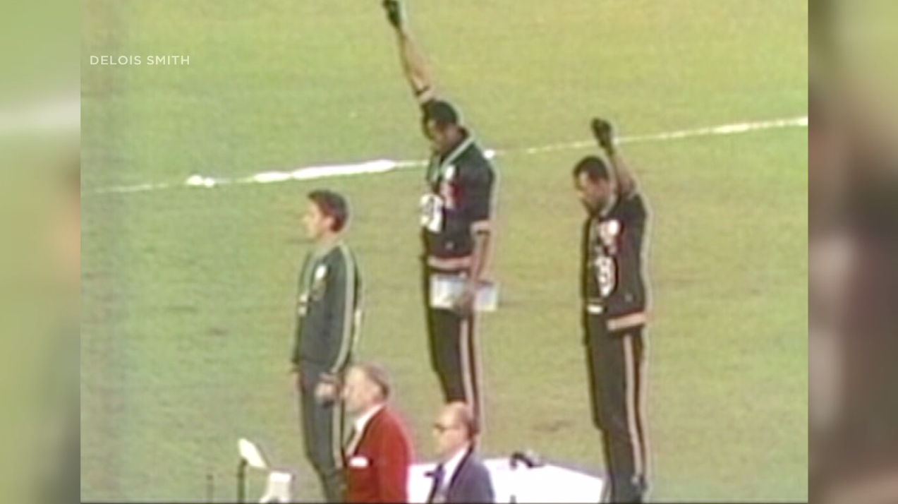 Tommie Smith at the podium. (Credit: Delois Smith)