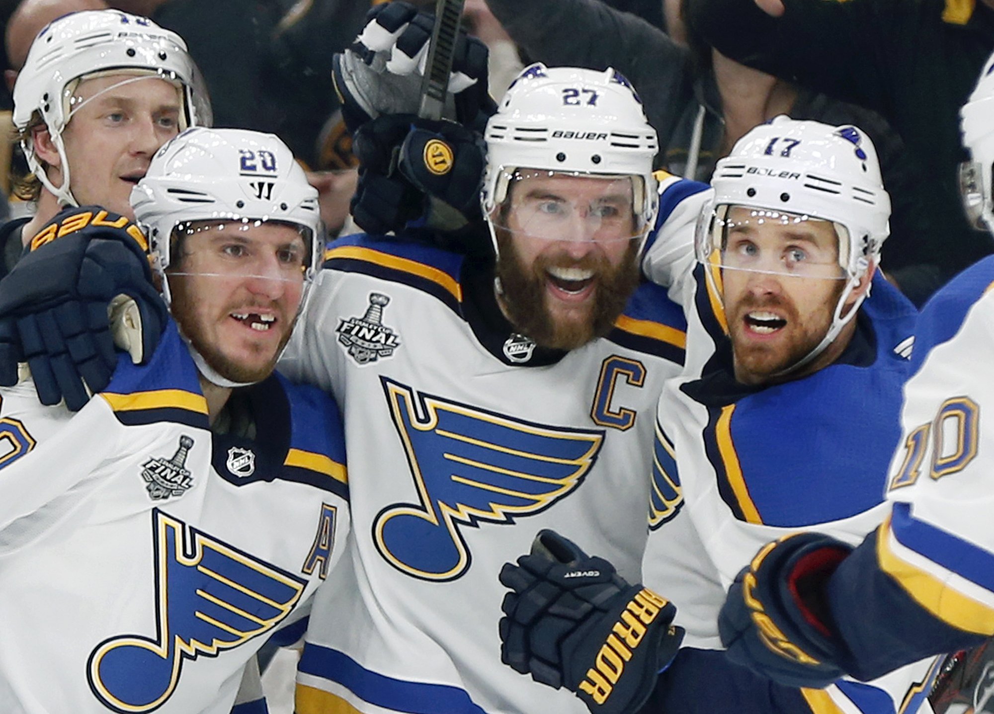 St. Louis Blues' Alex Pietrangelo, second from right, celebrates his goal with teammates Jay Bouwmeester, left rear, Alexander Steen, left, and Jaden Schwartz, right, during the first period in Game 7 of the NHL hockey Stanley Cup Final, Wednesday, June 12, 2019, in Boston. (AP Photo/Michael Dwyer)