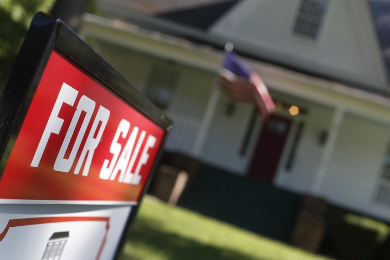 FILE - This June 20, 2019, file photo shows an existing home is offered for sale in Rutledge, Ga. Weaker home sales trends are expected to contribute to a sharp slowing in the home remodeling market. (AP Photo/John Bazemore, File)