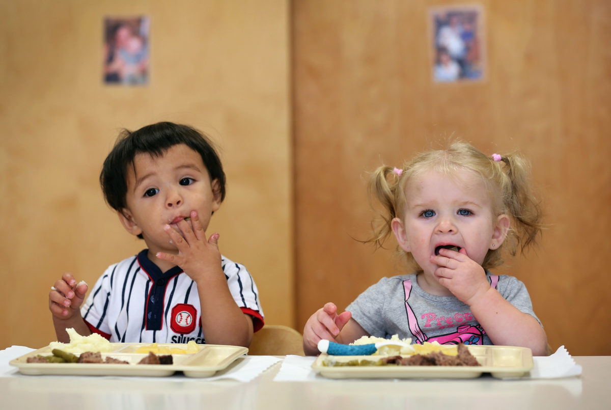 Kids eating a school lunch. (Credit: CBS News)