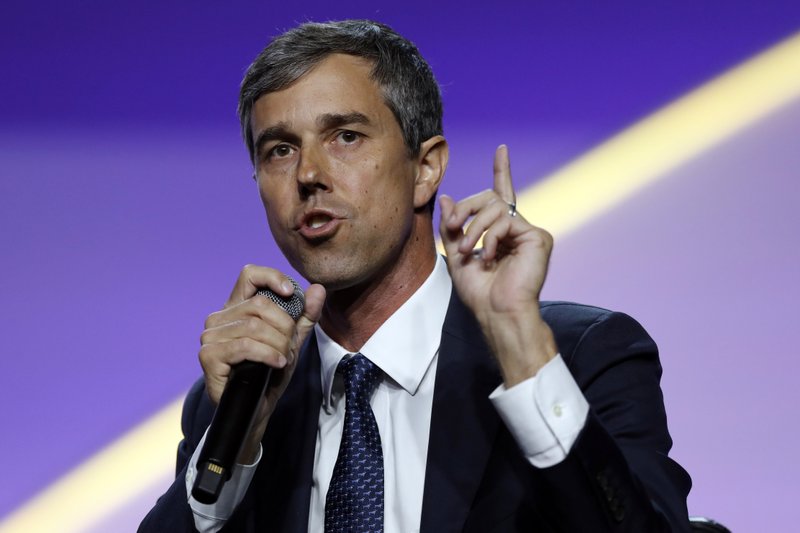 FILE - In this July 24, 2019, file photo, Democratic presidential candidate former Texas Rep. Beto O'Rourke, speaks during a candidates forum at the 110th NAACP National Convention in Detroit. As the U.S. economy flashes recession warning signs, Democratic presidential candidates are leveling pre-emptive blame on President Donald Trump. They argue that his aggressive and unpredictable tariff policies are to blame for gloomy economic forecasts. (AP Photo/Carlos Osorio)