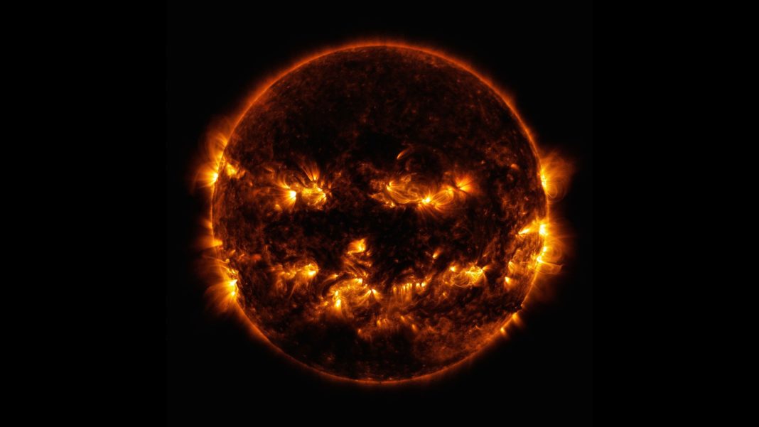 NASA on Sunday shared a photo on Facebook and Twitter of the sun looking a lot like a giant flaming jack-o'-lantern.