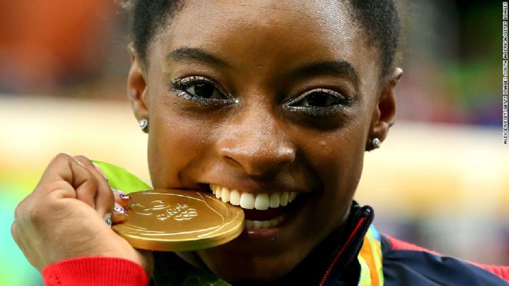 Simone Biles sets record for most world gymnastics championship medals. (Credit: CNN)