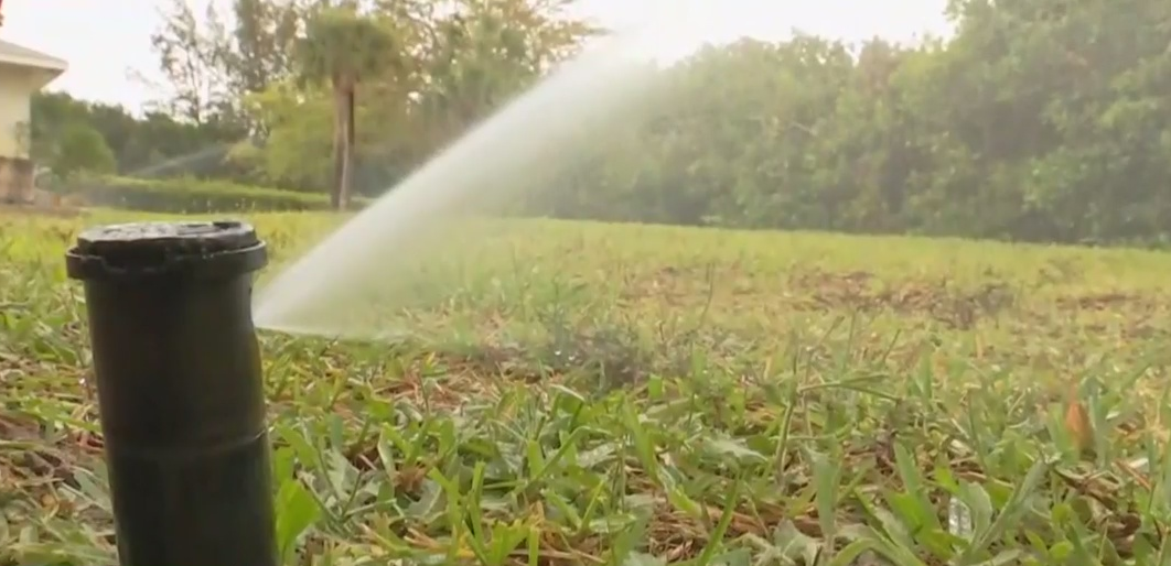Sprinklers at a Charlotte County homeowner's backyard. (Credit: WINK News)