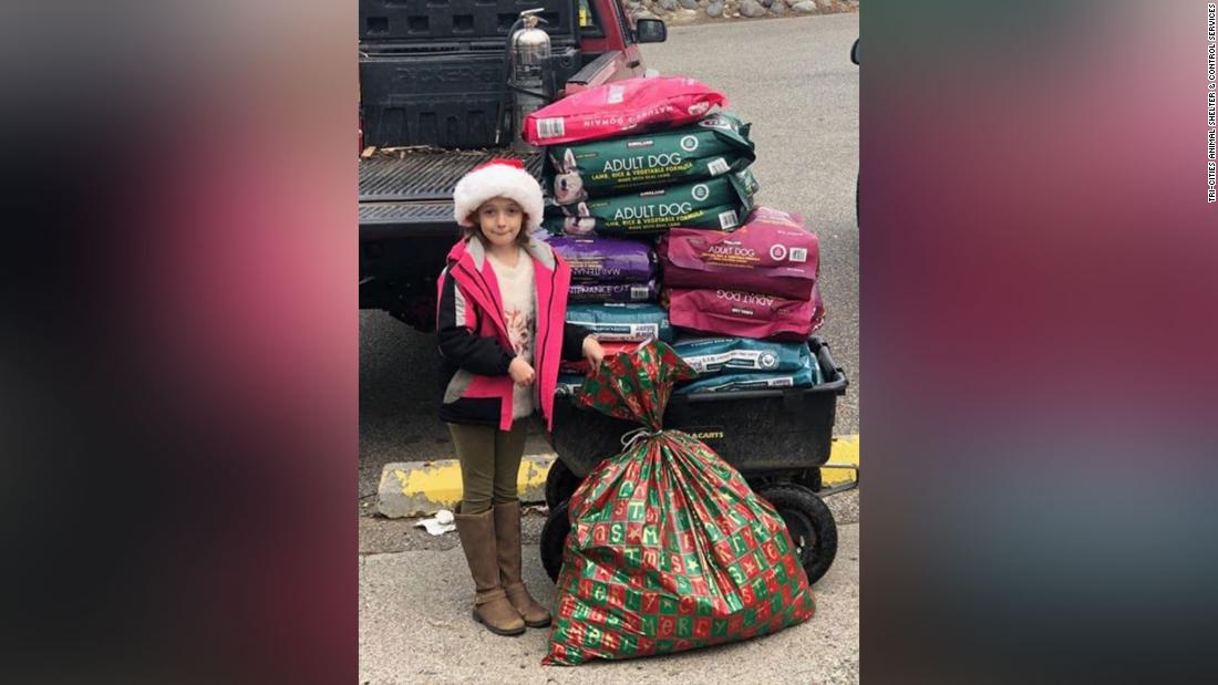 The 8-year-old’s Christmas wish was to help the dogs and cats at the Tri-Cities Animal Shelter, so she asked for money to buy pet food for Christmas instead of toys. (Credit: CNN)