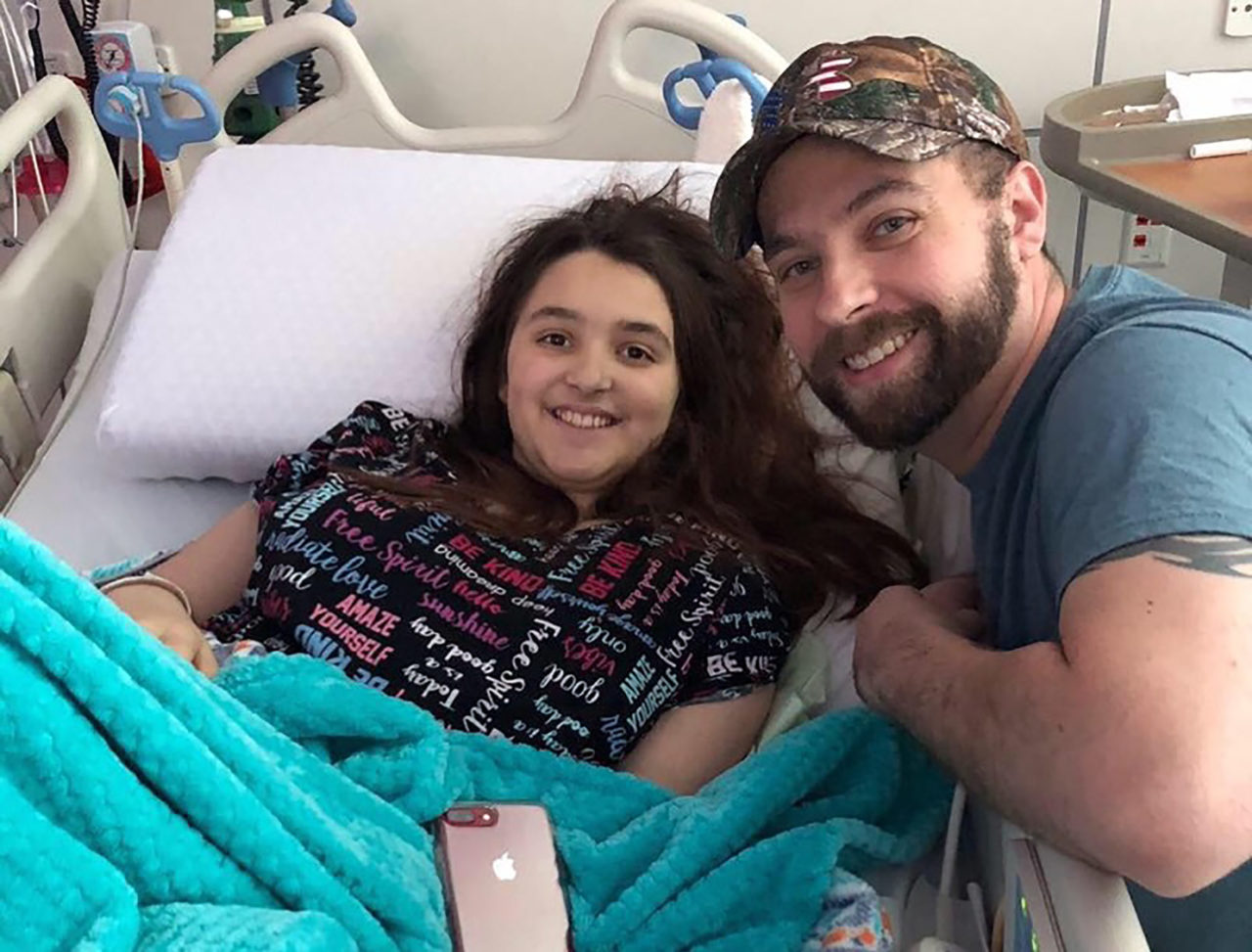 Chloe Cress with father, Shawn. After spending more than a year at St. Jude, Chloe will be making it home for Christmas. (Credit: Shawn Cress)