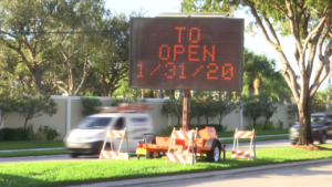 The previous sign alerting drivers to the opening of a Collier County roadway. The sign was changed the day after our story aired. (Credit: WINK News)