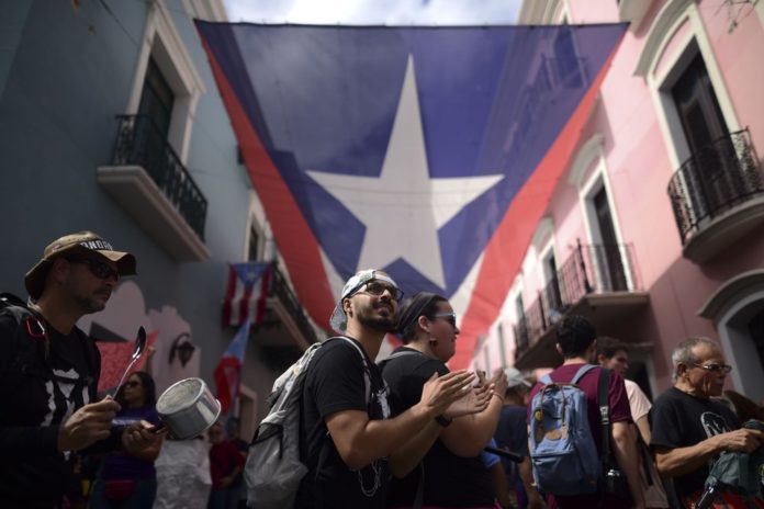 Puerto Rico Protesters Demand Governors Resignation