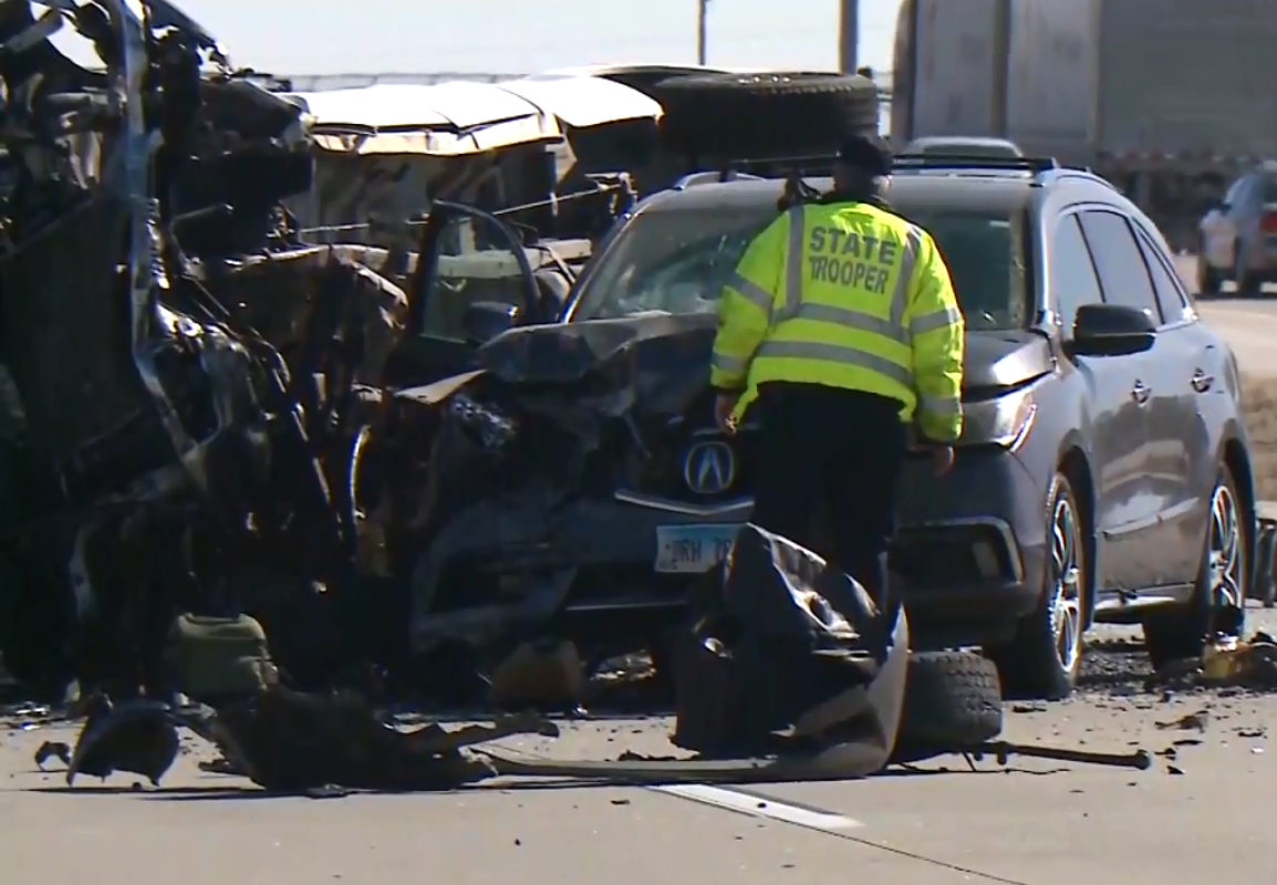 Four people were killed, including two teens, after a pickup truck crossed a median on Interstate 64 and struck the minivan they were in Friday morning. (Credit: CBS Kentucky)