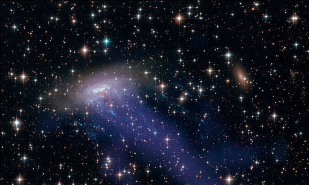FILE: NASA's Hubble Space Telescope has once again shown itself to be a crack investigator, recently capturing a distant spiral galaxy in the process of spilling its cosmic guts. (Credit: CBS News/FILE)