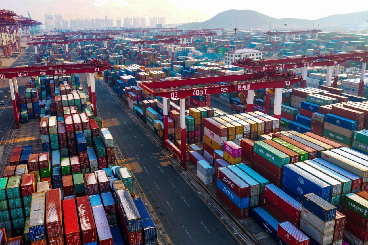 Containers are seen stacked at a port in Qingdao in China's eastern Shandong province on January 14, 2020. - China's trade surplus with the United States narrowed last year as the world's two biggest economies exchanged punitive tariffs in a bruising trade war, official data showed on January 14, on the eve of a deal to ease tensions. (Photo by STR / AFP) (Photo by STR/AFP via Getty Images)
