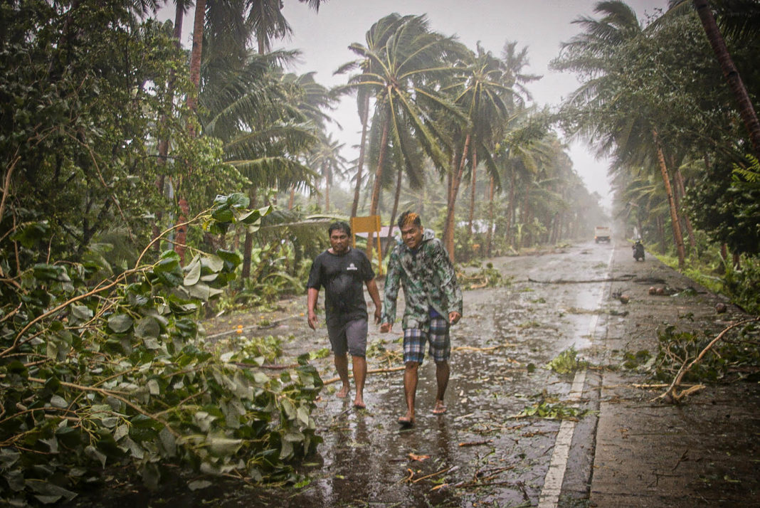 Tens of thousands under lockdown evacuate as Typhoon Vongfong strikes