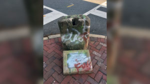 The 800-pound slave auction block was removed from a downtown corner after nearly two years of deliberation among City Council