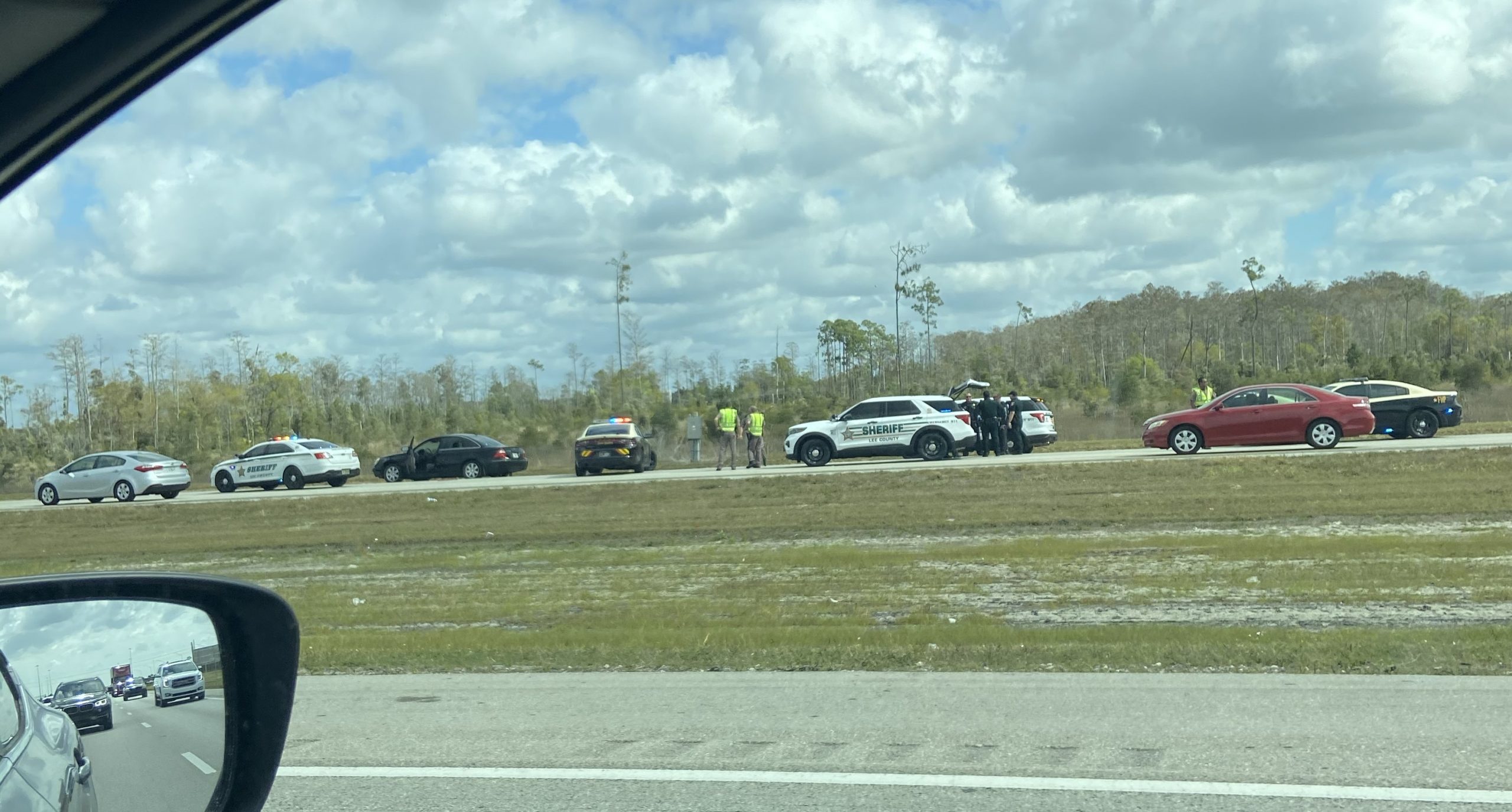 Lee County Sheriff's Office investigating stolen, abandoned car near I-75  on-ramp at Alico Rd.