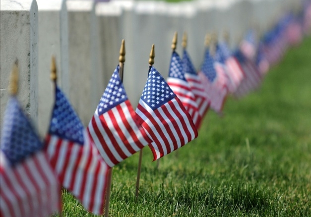 Soldiers placing 230,000 US flags at Arlington Cemetery